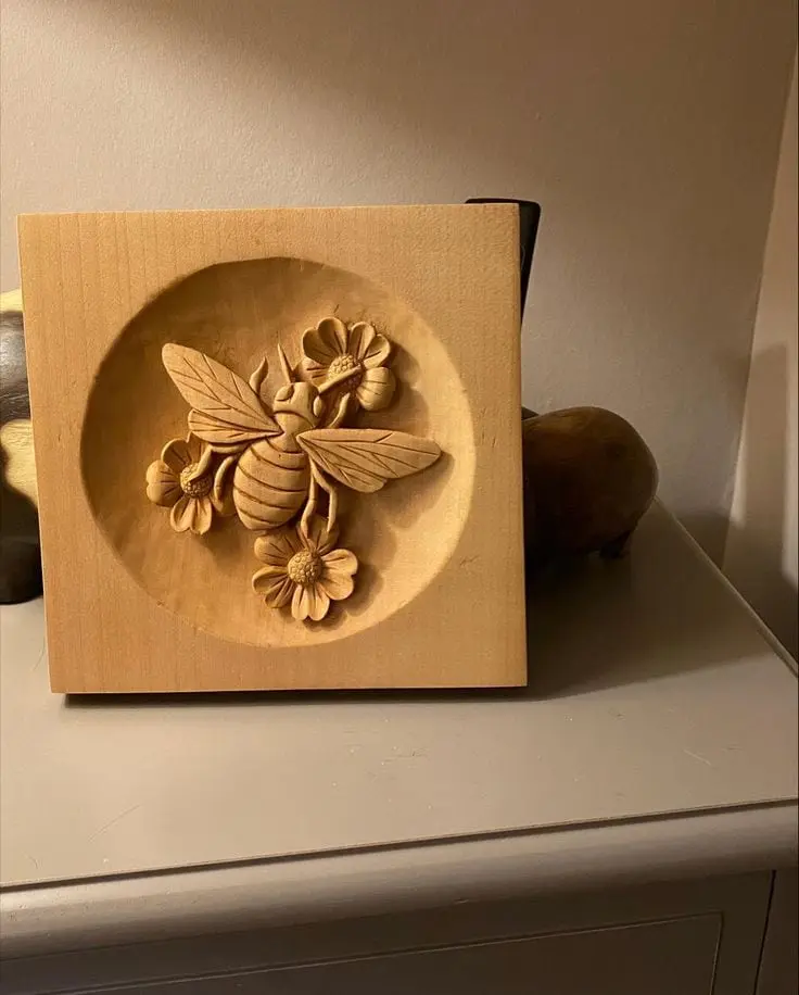 Sample of a complex 3D wood carving from mahogany using a 5-axis CNC machine