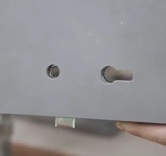 4 axis CNC Router machining keyhole and lock holes on finished cabinet door