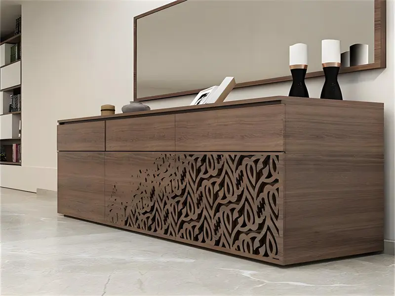 CNC router crafting intricate wooden cabinet doors