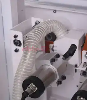 Automatic Glue Purge and Nozzle Cleaning System