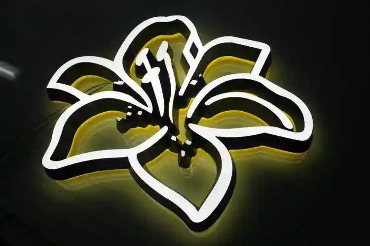 Backlit flower shape sign made by cnc router for signage