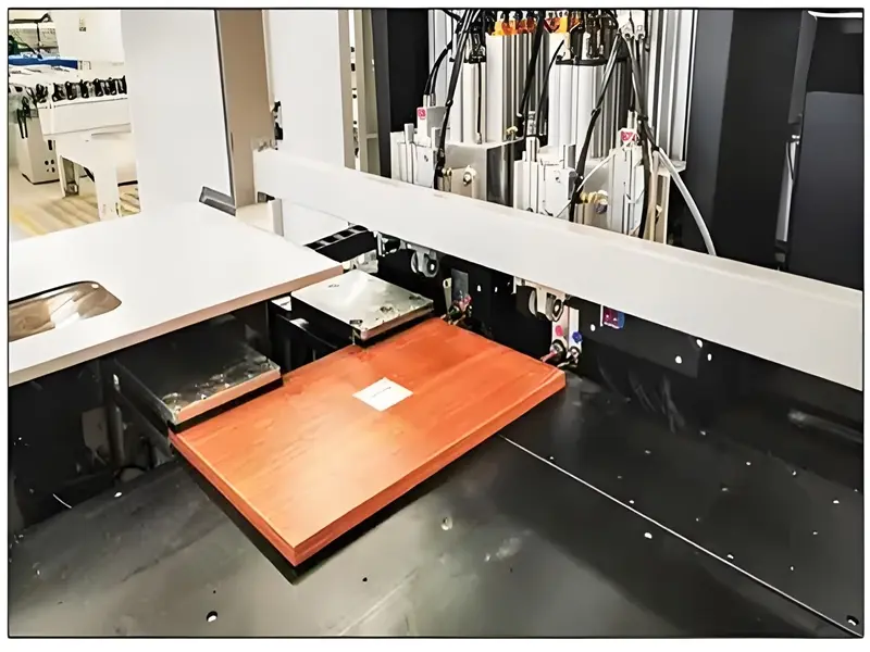 Multiple furniture panels being engraved simultaneously by a CNC machine, showcasing efficient mass production and perfect consistency