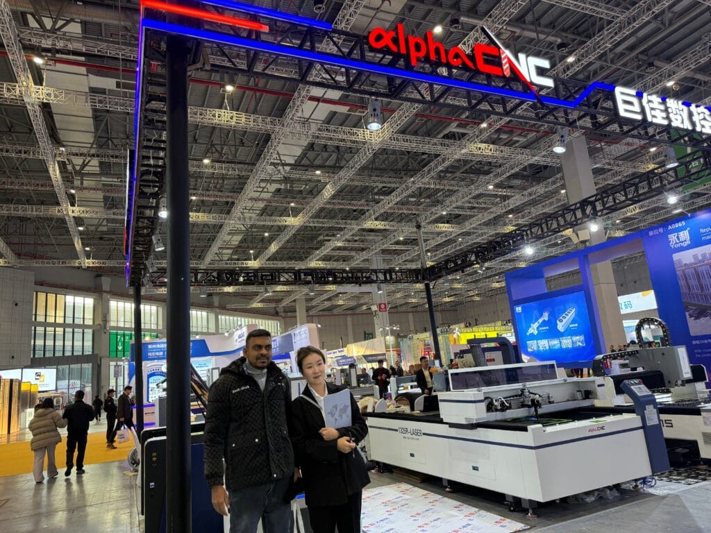 CNC machine safety-Group photo with the client at the exhibition