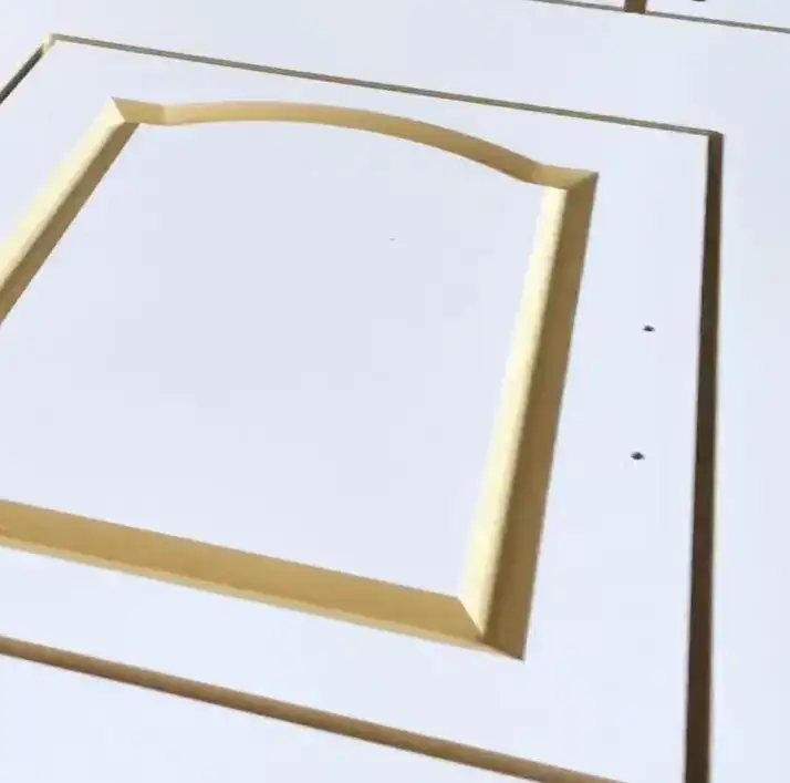 A precisely cut wooden furniture panel with complex designs, showcasing the clean cutting quality of the APS-2030-DR CNC router.