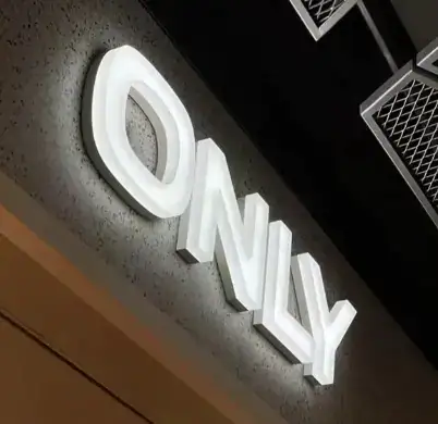 CNC sign making machine carving 3D logo on PVC board