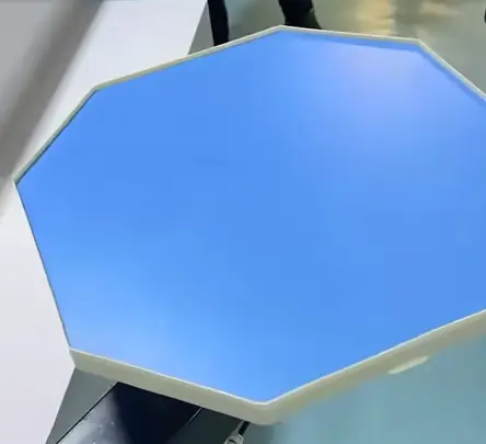 Precision edge banding on a custom shaped wood panel for furniture