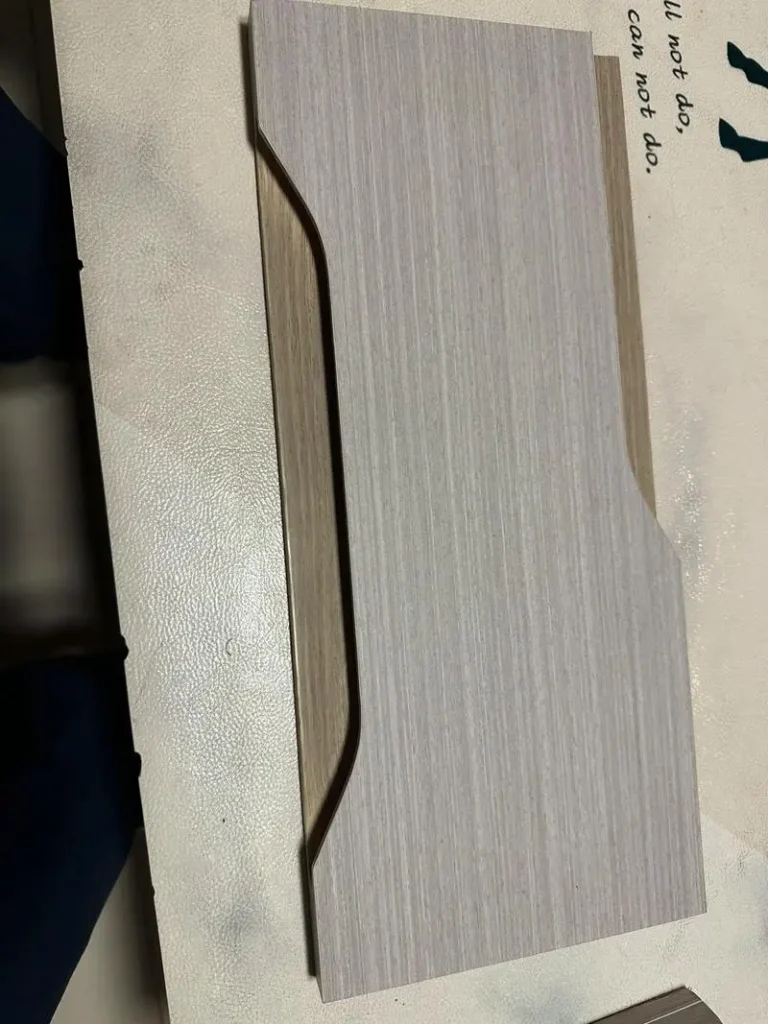 Soft-formed edge banding on modern kitchen cabinet