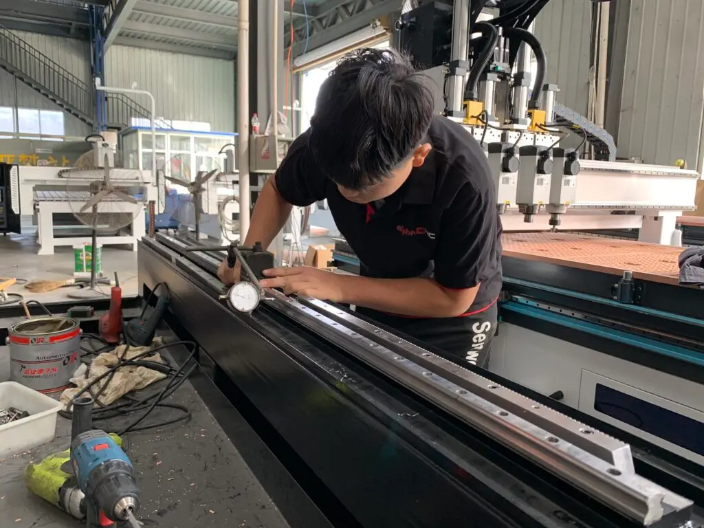 factory-worker-operating-CNC-milling-machine