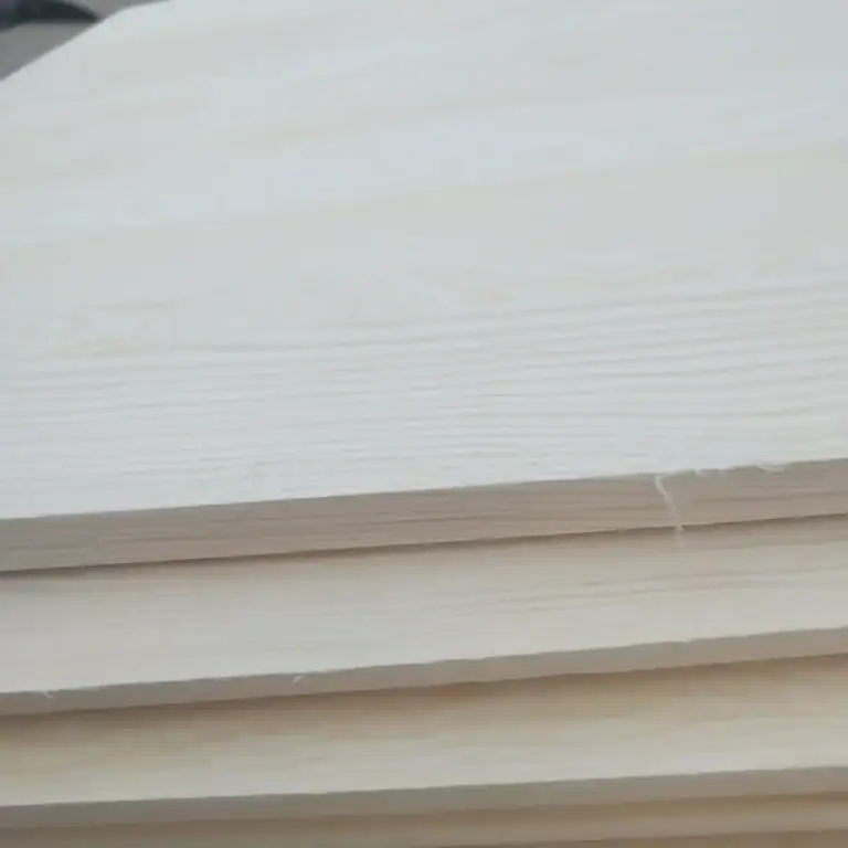 Macro view of the finished edge profile showing a sharp, clean edge with a high-gloss, polished surface ready for assembly.