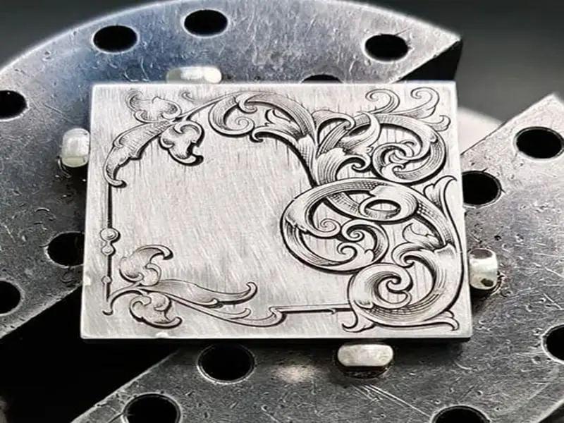 Sample cross-section of a laser-welded metal joint, highlighting the strength and cleanliness of the weld