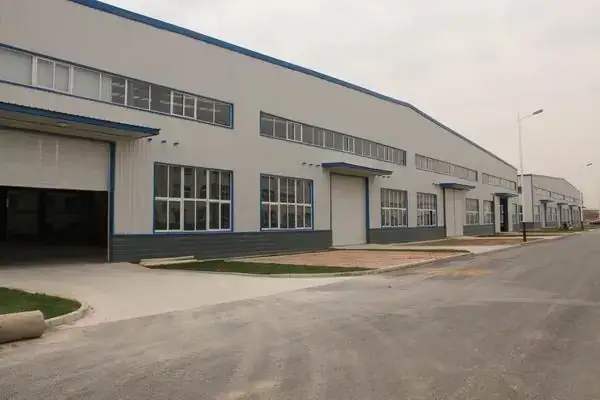 Modern CNC engraving machine manufacturing plant with automated production lines and spacious workshop