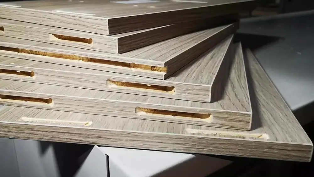 Smooth, chip-free edge on a laminated plywood bookshelf panel