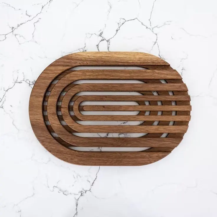 Intricate geometric pattern laser cut from birch plywood for modern home decor