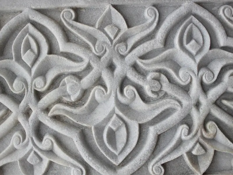 Decorative limestone blocks for a building facade, featuring patterns carved by a CNC stone cutting saw