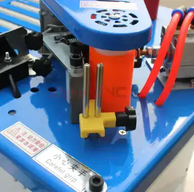 Workpiece entering the edge banding machine's feed system