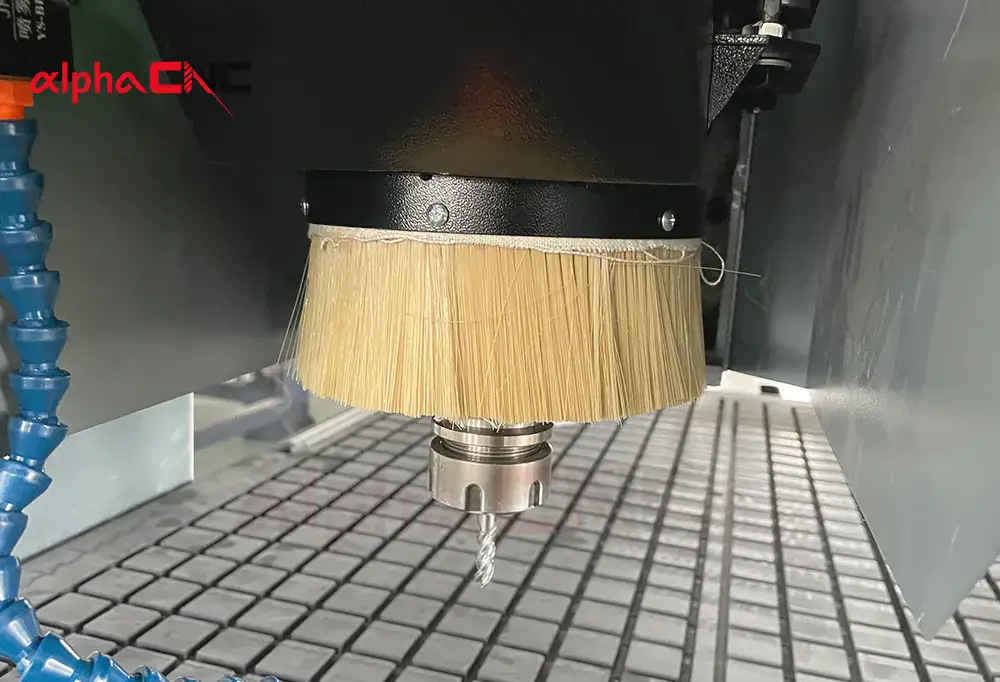wood cnc router spindle dust brush and wood cutting drill bit closeup